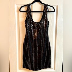 Material Girl Collection Woman’s Black Sequence Sparkly Dress, size Medium.